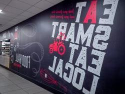 Wall-sized mural advertisement