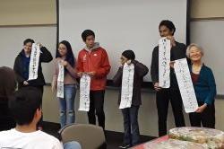 Students learning Asian Caligraphy